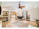 Comfortable living room with light tile floors and a view into the kitchen at 1813 Nova Dr, Valrico, FL 33596