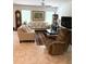 Cozy living room featuring neutral decor, a ceiling fan, and comfortable seating arrangement at 18292 Hunters Meadow Walk, Land O Lakes, FL 34638