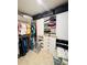 Organized walk-in closet with custom shelving and ample storage space at 18292 Hunters Meadow Walk, Land O Lakes, FL 34638