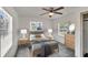 This virtually staged bedroom is enhanced with trendy decor, natural light, and ample space at 1920 E Chelsea St, Tampa, FL 33610