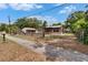 Charming home with well-maintained front yard and adjacent sidewalk at 1920 E Chelsea St, Tampa, FL 33610