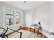Bright bedroom features hardwood floors, white walls, and natural light at 2015 3Rd S St, St Petersburg, FL 33705