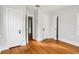 Bedroom features hardwood floors, white walls, and multiple closets at 2015 3Rd S St, St Petersburg, FL 33705