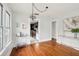 Bright dining area featuring hardwood floors, stylish lighting, and an inviting atmosphere at 2015 3Rd S St, St Petersburg, FL 33705