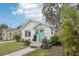 Cozy home featuring lush greenery, well-kept lawn, and inviting entryway at 2015 3Rd S St, St Petersburg, FL 33705