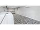 Spacious garage featuring a decorative tile floor, storage and access to laundry at 2015 3Rd S St, St Petersburg, FL 33705