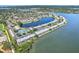 Waterfront community featuring tennis courts, manicured grounds, and scenic water views at 219 Pompano Se Dr # C, St Petersburg, FL 33705