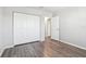 This bedroom offers sleek flooring and plenty of closet space for optimal storage at 219 Pompano Se Dr # C, St Petersburg, FL 33705
