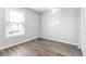 Cozy bedroom with ample natural light, perfect for a restful retreat with neutral decor at 219 Pompano Se Dr # C, St Petersburg, FL 33705