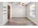 Bright dining area features updated flooring, ceiling fan, and plentiful natural light at 219 Pompano Se Dr # C, St Petersburg, FL 33705