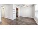 Bright dining area features updated flooring, ceiling fan, and plentiful natural light at 219 Pompano Se Dr # C, St Petersburg, FL 33705