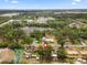 Aerial view shows the home's proximity to a pond, shopping and area amenities at 2313 Palm Ave, Seffner, FL 33584