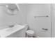 Bathroom featuring a modern vanity, sleek fixtures, and minimalist design at 2313 Palm Ave, Seffner, FL 33584