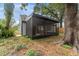 Picture of the house with a screened-in patio with views to the back yard at 2313 Palm Ave, Seffner, FL 33584