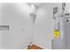 Utility room with water heater and hookups at 2313 Palm Ave, Seffner, FL 33584