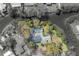 An overhead perspective highlights a private swimming pool along with a soothing canal, embraced by verdant surroundings at 2416 S 46Th St, Tampa, FL 33619