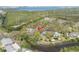 From above, this waterfront property has easy access to a tranquil canal and showcases mature landscaping at 2416 S 46Th St, Tampa, FL 33619