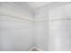 Spacious walk-in closet featuring plenty of shelving, ample room for organization, and bright lighting at 2770 Keats Ter # C, Palm Harbor, FL 34684