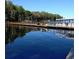 Community boat dock with boats and plenty of room to enjoy the water at 2770 Keats Ter # C, Palm Harbor, FL 34684