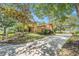 Charming home featuring lush landscaping and a long driveway at 2770 Keats Ter # C, Palm Harbor, FL 34684