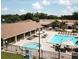 Enjoy the swimming pool and hot tub with plenty of chairs for relaxing in the sun at 2770 Keats Ter # C, Palm Harbor, FL 34684
