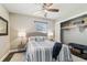 Inviting bedroom featuring stylish decor, a comfortable bed, and well-organized closet space at 2830 Anthony St, Tampa, FL 33619