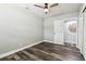 Bedroom featuring hardwood floors, a ceiling fan, and neutral-colored walls at 2830 Anthony St, Tampa, FL 33619