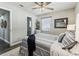 Cozy bedroom with stylish decor, a comfortable bed, and convenient access to an adjacent bathroom at 2830 Anthony St, Tampa, FL 33619