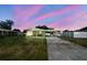 Lovely single-story house with a carport and a front yard at 2830 Anthony St, Tampa, FL 33619