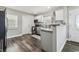 Charming kitchen with white subway tile, stainless steel appliances, and granite countertops at 2830 Anthony St, Tampa, FL 33619