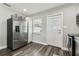 Bright kitchen area featuring stainless steel refrigerator and pantry at 2830 Anthony St, Tampa, FL 33619