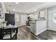 Bright eat-in kitchen featuring stainless steel appliances and white cabinets at 2830 Anthony St, Tampa, FL 33619