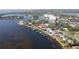 Waterfront property featuring a private dock and a luxurious swimming pool at 3227 Bayshore Ne Blvd, St Petersburg, FL 33703