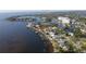 Waterfront home on a canal, featuring a pool, private dock, and lush landscaping at 3227 Bayshore Ne Blvd, St Petersburg, FL 33703
