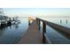 Scenic dock view with boats, calm water, and a clear sky, creating a tranquil waterfront setting at 3227 Bayshore Ne Blvd, St Petersburg, FL 33703