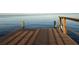 Waterfront living is showcased by this dock leading out to calm waters, ideal for relaxation at 3227 Bayshore Ne Blvd, St Petersburg, FL 33703