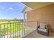 A furnished balcony offers relaxing outdoor seating and neighborhood views at 3282 Mangrove Point Dr, Ruskin, FL 33570