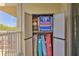 Balcony storage with beach chairs, balls, and accessories, providing convenient outdoor organization and recreation equipment at 3282 Mangrove Point Dr, Ruskin, FL 33570