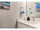 Clean bathroom with modern fixtures, a new sink, and decorative artwork at 3282 Mangrove Point Dr, Ruskin, FL 33570