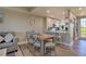 Open concept layout showing the dining area adjacent to a modern kitchen at 3282 Mangrove Point Dr, Ruskin, FL 33570