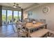 Cozy dining area with natural light from sliding doors leading to the balcony at 3282 Mangrove Point Dr, Ruskin, FL 33570
