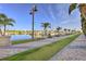 Picturesque marina with lush landscaping and inviting brick sidewalks, offering stunning waterfront views and a perfect spot for leisurely walks at 3282 Mangrove Point Dr, Ruskin, FL 33570