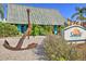 The exterior features a charming anchor and the sign for Sunset Grill & Beach Bar at 3282 Mangrove Point Dr, Ruskin, FL 33570