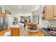 Open-concept design with a view of the kitchen, living room, and dining area at 3506 Cordgrass Dr, Valrico, FL 33596