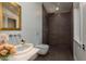 Contemporary bathroom with modern floating sink, rainfall shower and stylish tile at 3752 Arkansas Ne Ave, St Petersburg, FL 33703