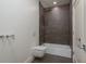 Modern bathroom with stylish fixtures, sleek shower, and a unique toilet design at 3752 Arkansas Ne Ave, St Petersburg, FL 33703