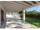 A beautiful patio with white columns and a stairway entrance to the main house at 3752 Arkansas Ne Ave, St Petersburg, FL 33703
