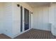 Charming porch with stylish blue double door, wood ceiling, and elegant wall paneling at 3752 Arkansas Ne Ave, St Petersburg, FL 33703