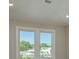 Close up on windows that provide natural light and views of the surrounding neighborhood at 3752 Arkansas Ne Ave, St Petersburg, FL 33703