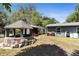 Property with backyard well and sheds, offering ample outdoor storage and unique features at 39252 Kimberly Ave, Zephyrhills, FL 33540